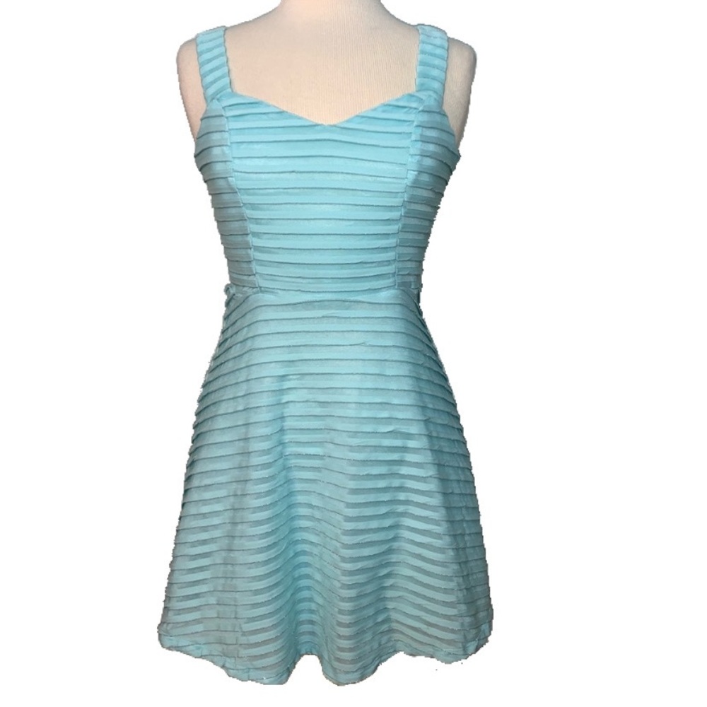 Icy blue fit and flare dress with back cut out